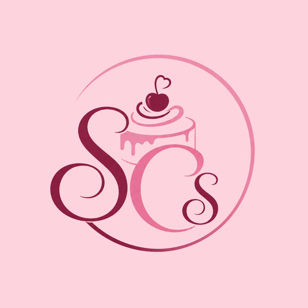 Logo with 'SCS' initials and a cake illustration on a pink background